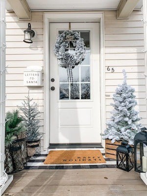 simple and festive christmas apartment porch decor