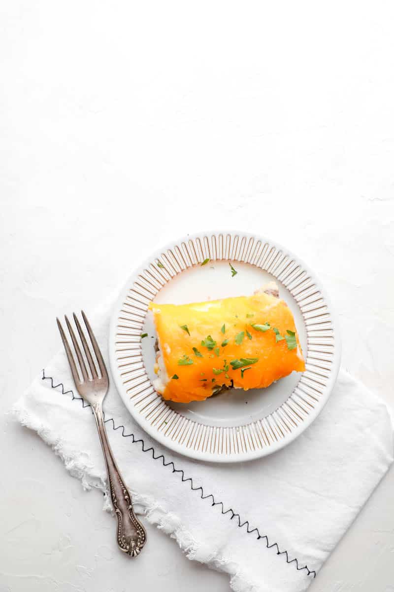 shepherds pie served on a plate with a fork