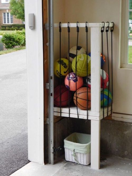 outdoor Ball Storage using bungee cords garage organization idea