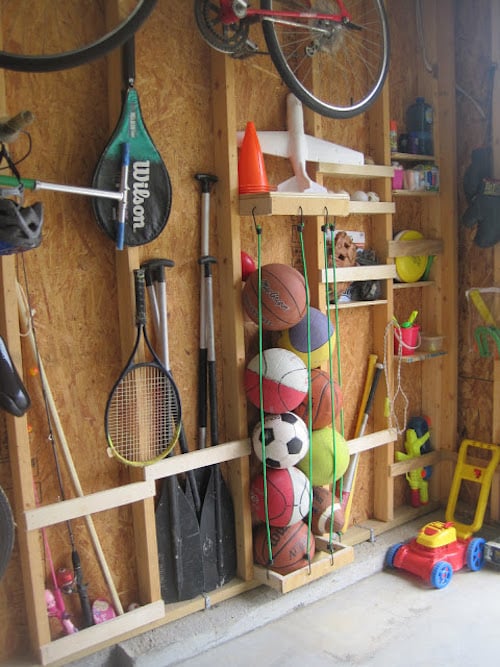 Using studs to organize the garage wall