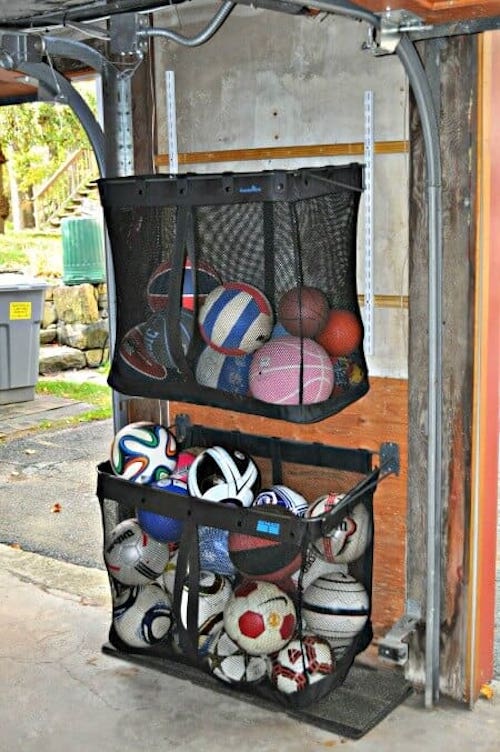 outdoor Ball organizer using mesh laundry baskets hung in the garage