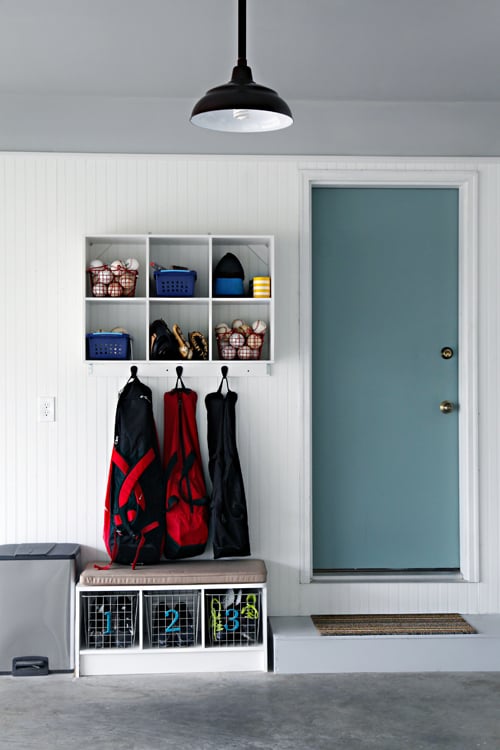 garage mudroom organization idea with wall mounted shelving