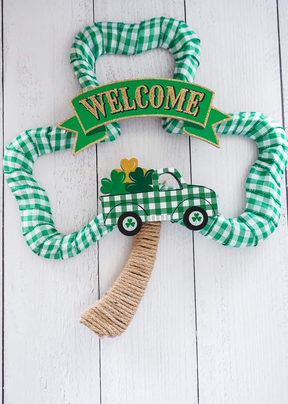 shamrock wreath with welcome sign and green truck