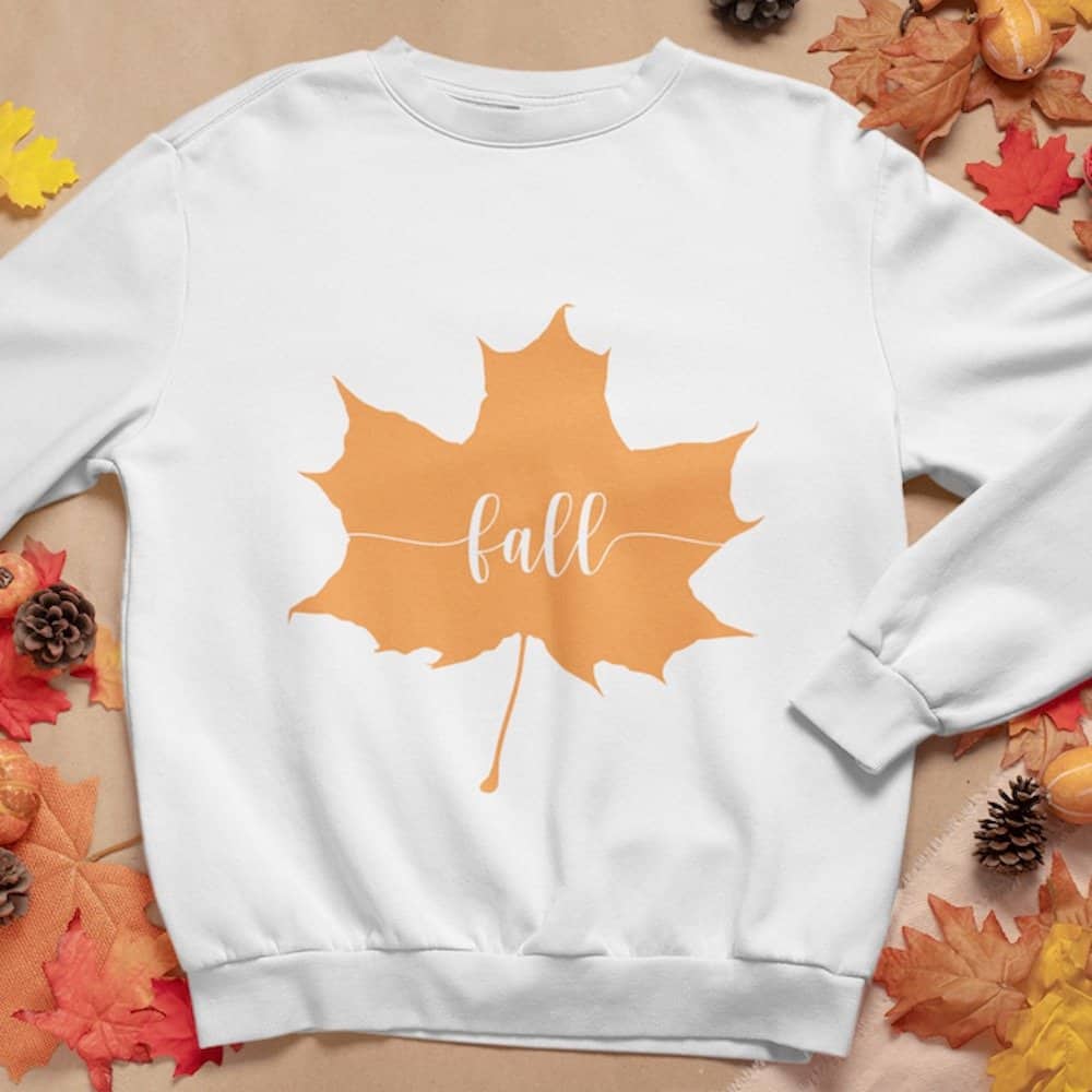 fall word in a leaf on a hoodie fall svg