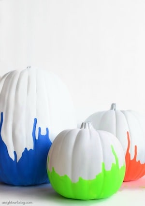 neon painted dipped pumpkins