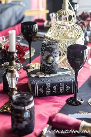 red, black and gold Halloween table setting decor