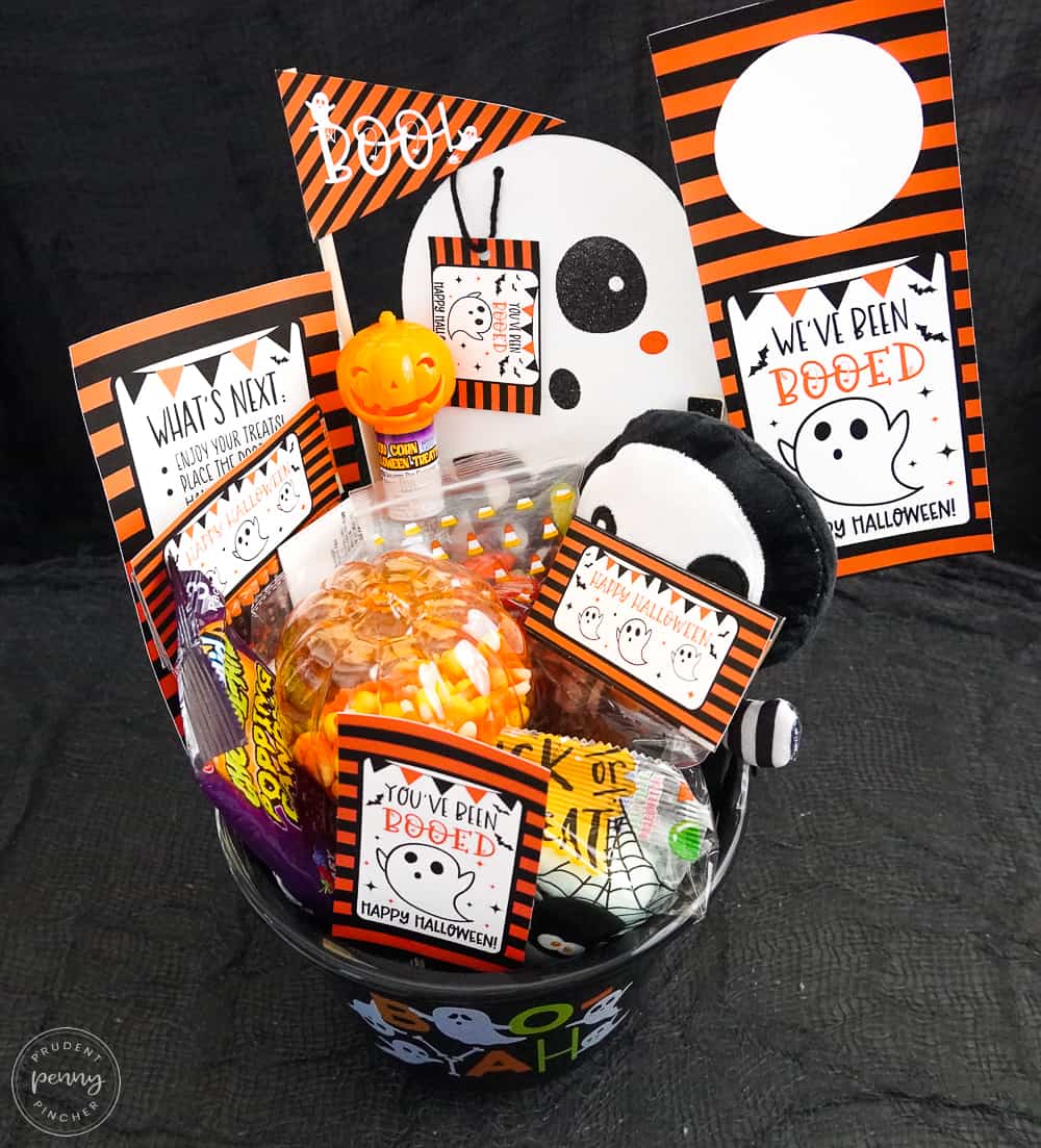 halloween basket on black background with creepy cloth