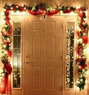 christmas garland around apartment door