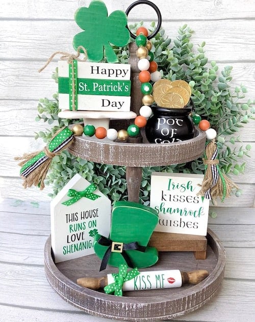 green and white st patrick's day signs on wooden tray