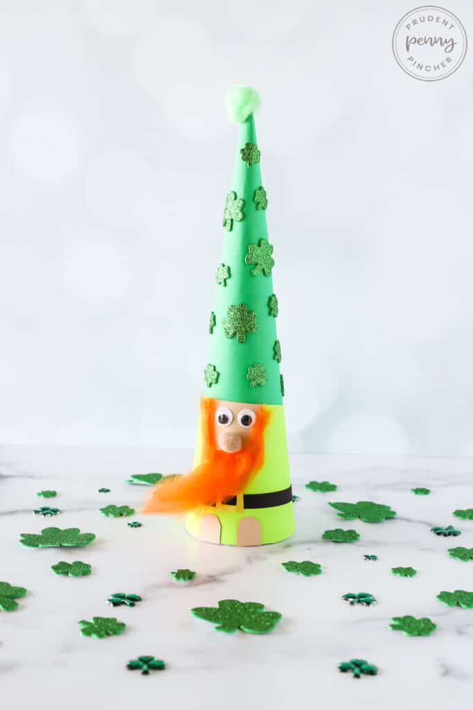 leprechaun gnome with shamrocks in background