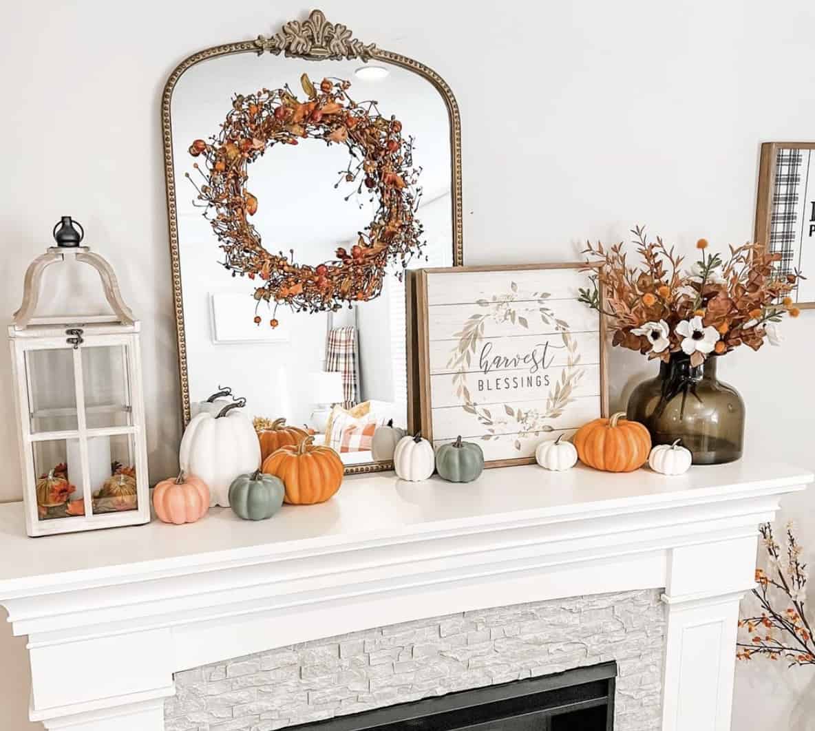 harvest mantel with mirror and bittersweet wreath
