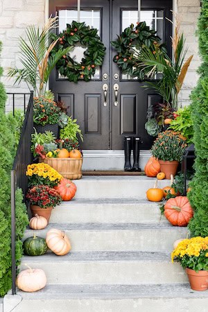 Harvest Porch with Pumpkins and Wreaths