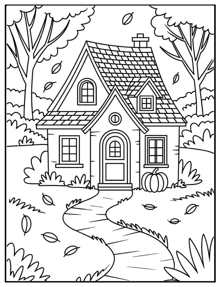 Cozy cottage with autumn leaves and pumpkin