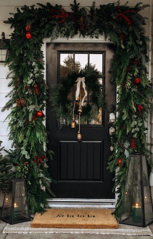 Holiday Front Porch with evergreen garland and wreath