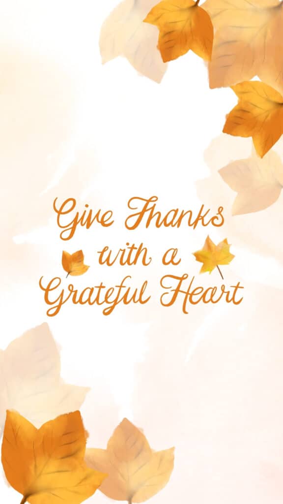 Give thanks with a grateful heart message surrounded by golden leaves