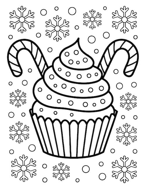 Swirly cupcake topped with two peppermint sticks
