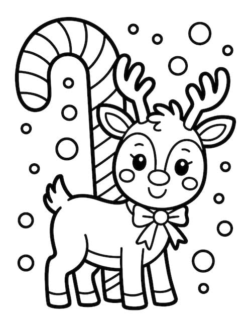 Cute reindeer posing beside a giant candy cane