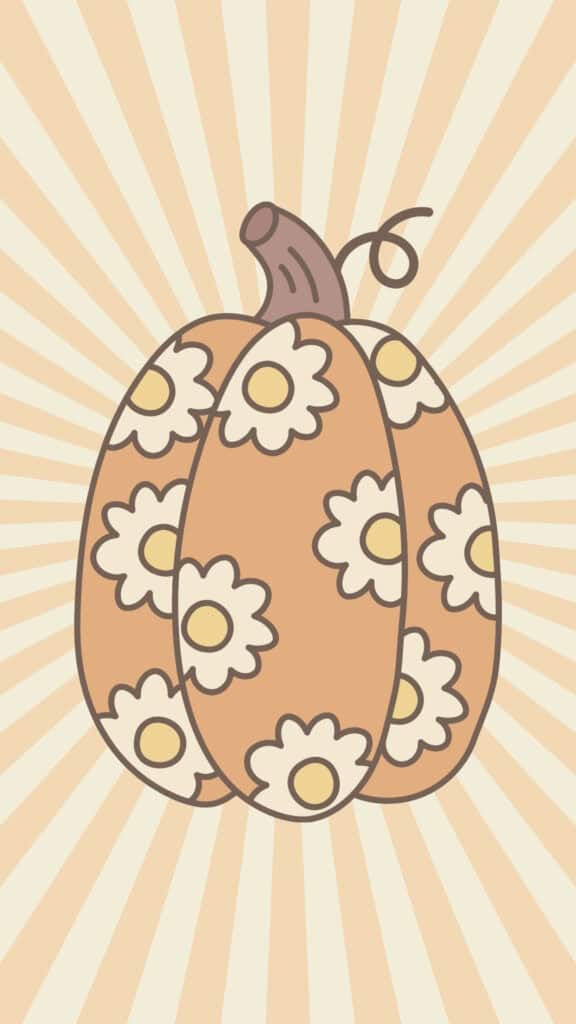 Groovy pumpkin decorated with daisies on a soft beige sunburst