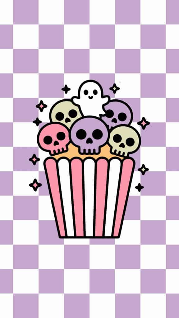Pastel skull popcorn with a tiny ghost on a purple checkerboard