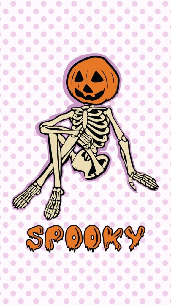retro pumpkin-head skeleton sitting on a pink polka-dot Halloween wallpaper